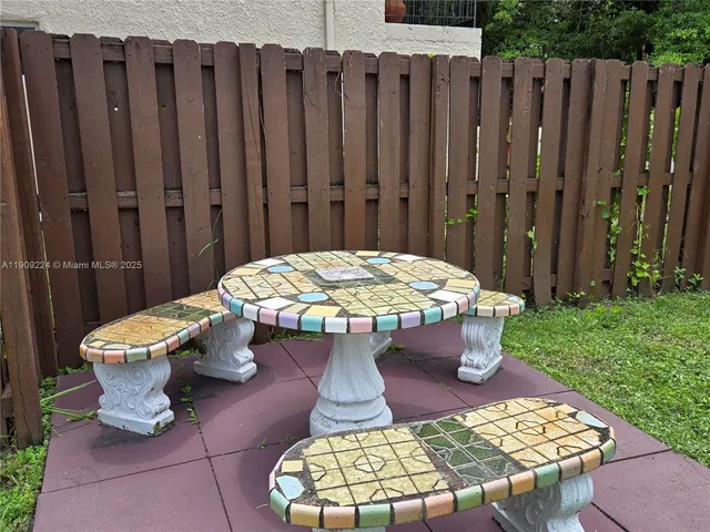 a outdoor view with a seating space