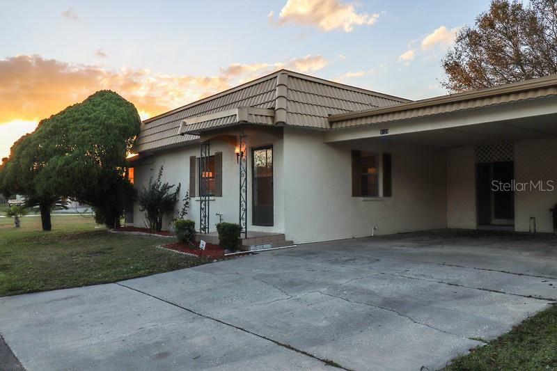 9129 Via Recreo New Port Richey, FL 34655 - Photo 1 of 1 a view of house with outdoor space