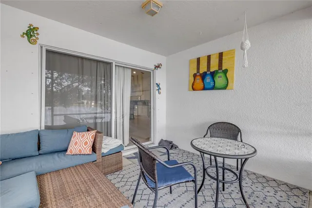 an aerial view of residential building and lake