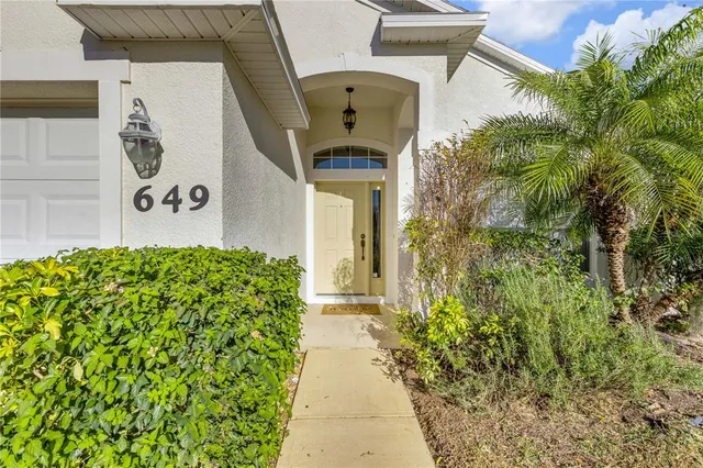 a view of a workspace with furniture