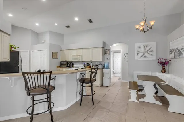 a living room with furniture rug and window