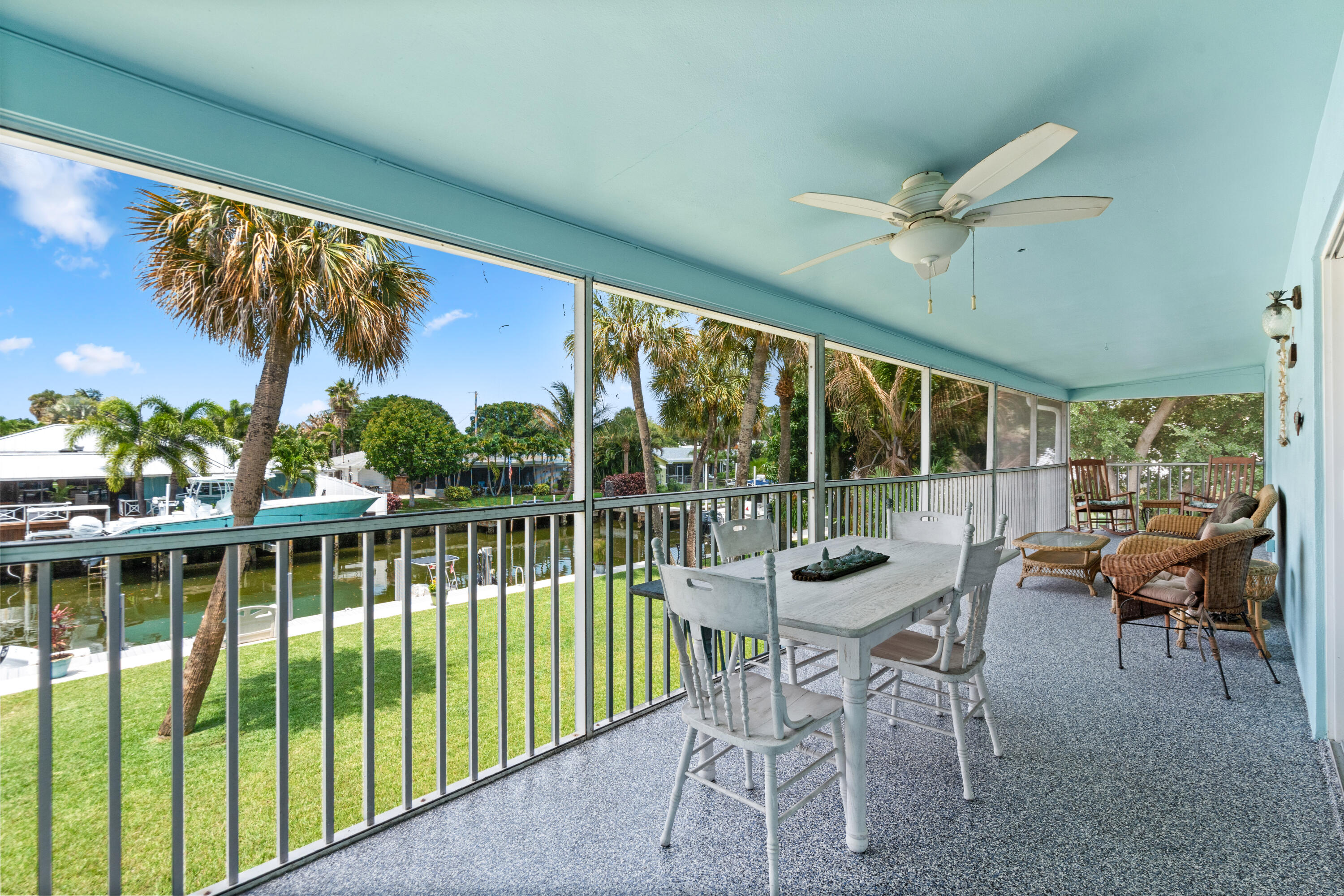 249 Center Street, Unit 2C Jupiter, FL 33458 - Photo 4 of 29 a view of a balcony with lake view and a potted plant