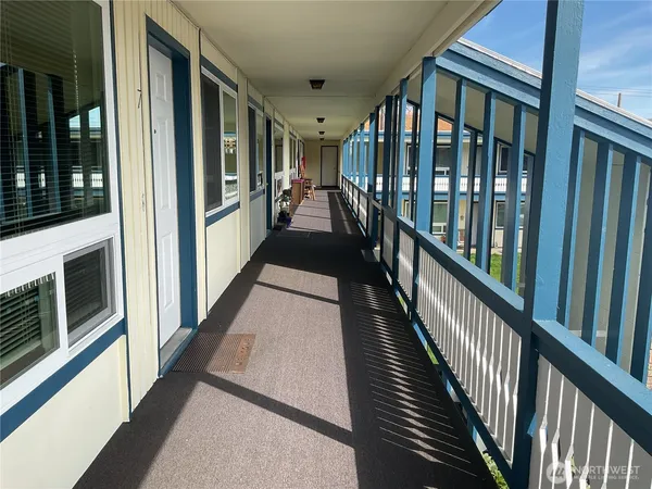 a view of a porch with seating space