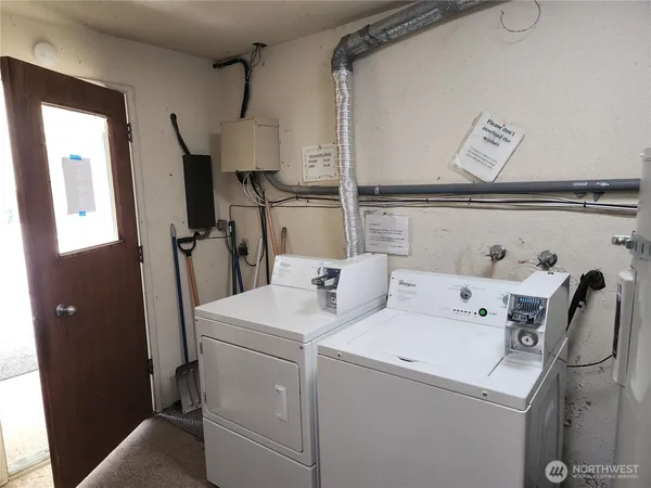 a utility room with dryer and washer