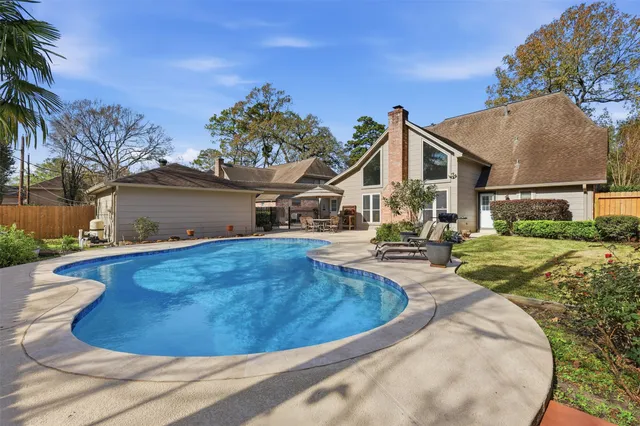 a view of a house with a swimming pool