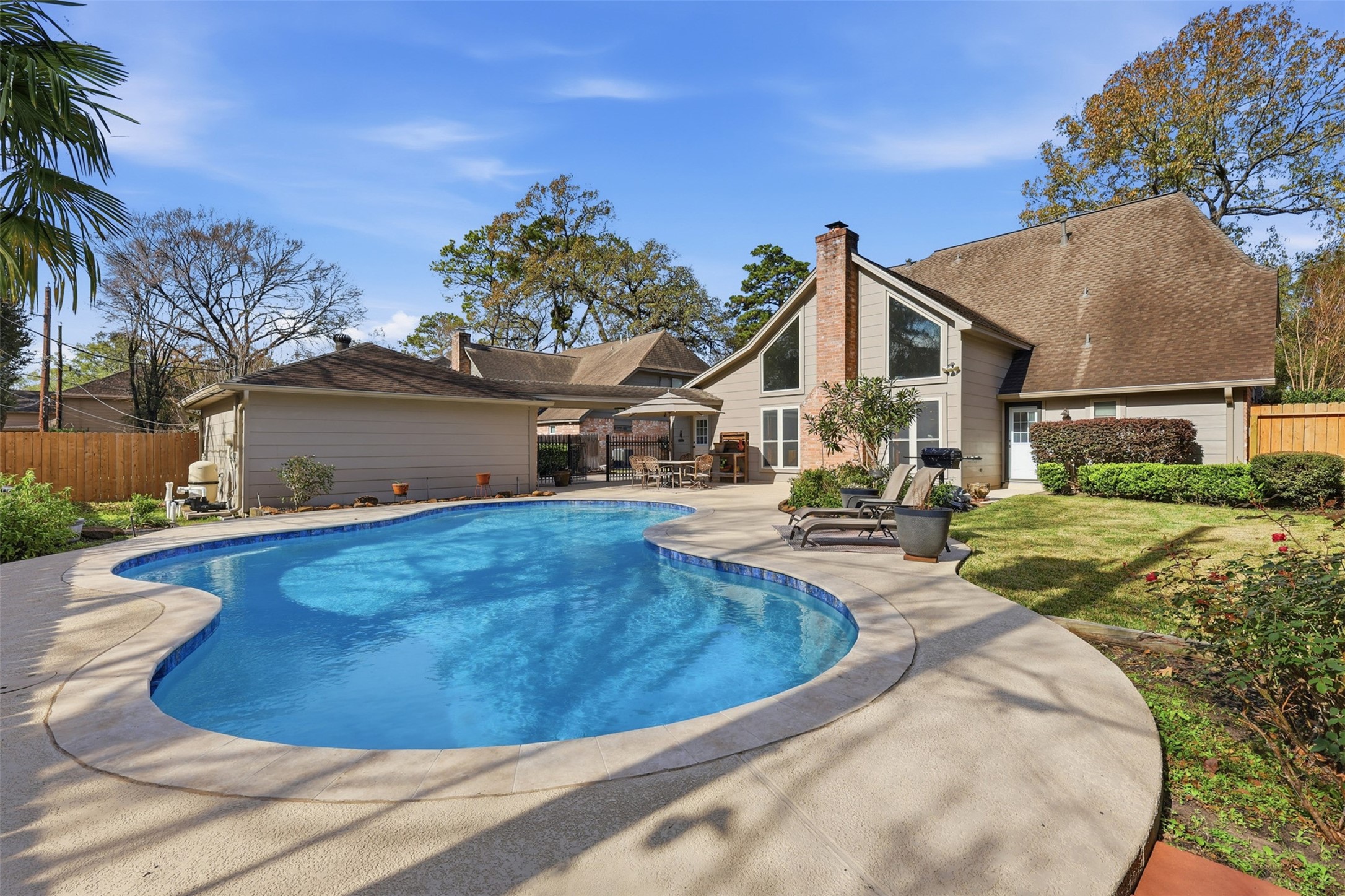 3415 Flickering Candle Drive Spring, TX 77388 - Photo 1 of 36 a view of a house with a swimming pool