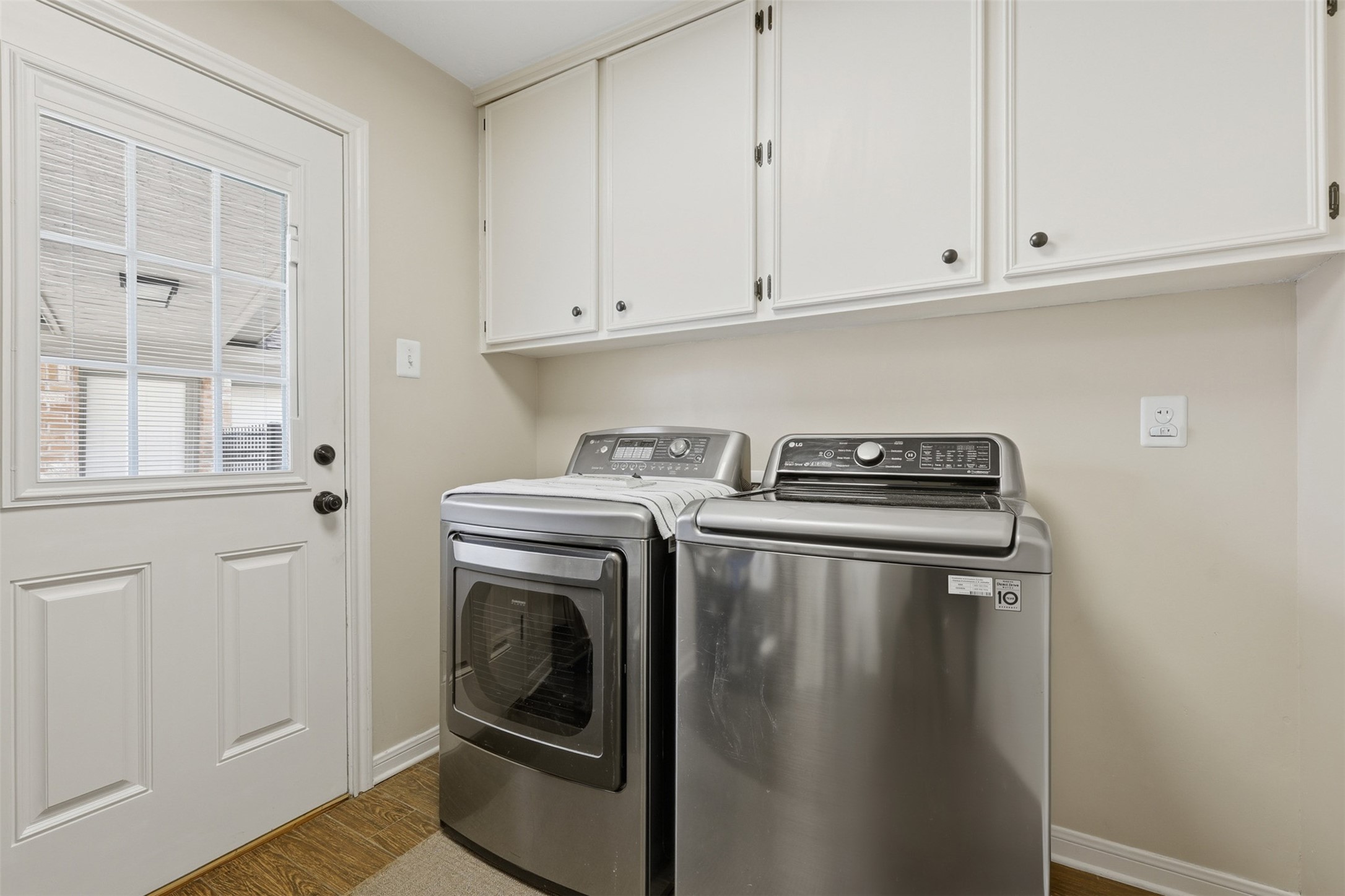 3415 Flickering Candle Drive Spring, TX 77388 - Photo 15 of 36 a utility room with dryer and washer