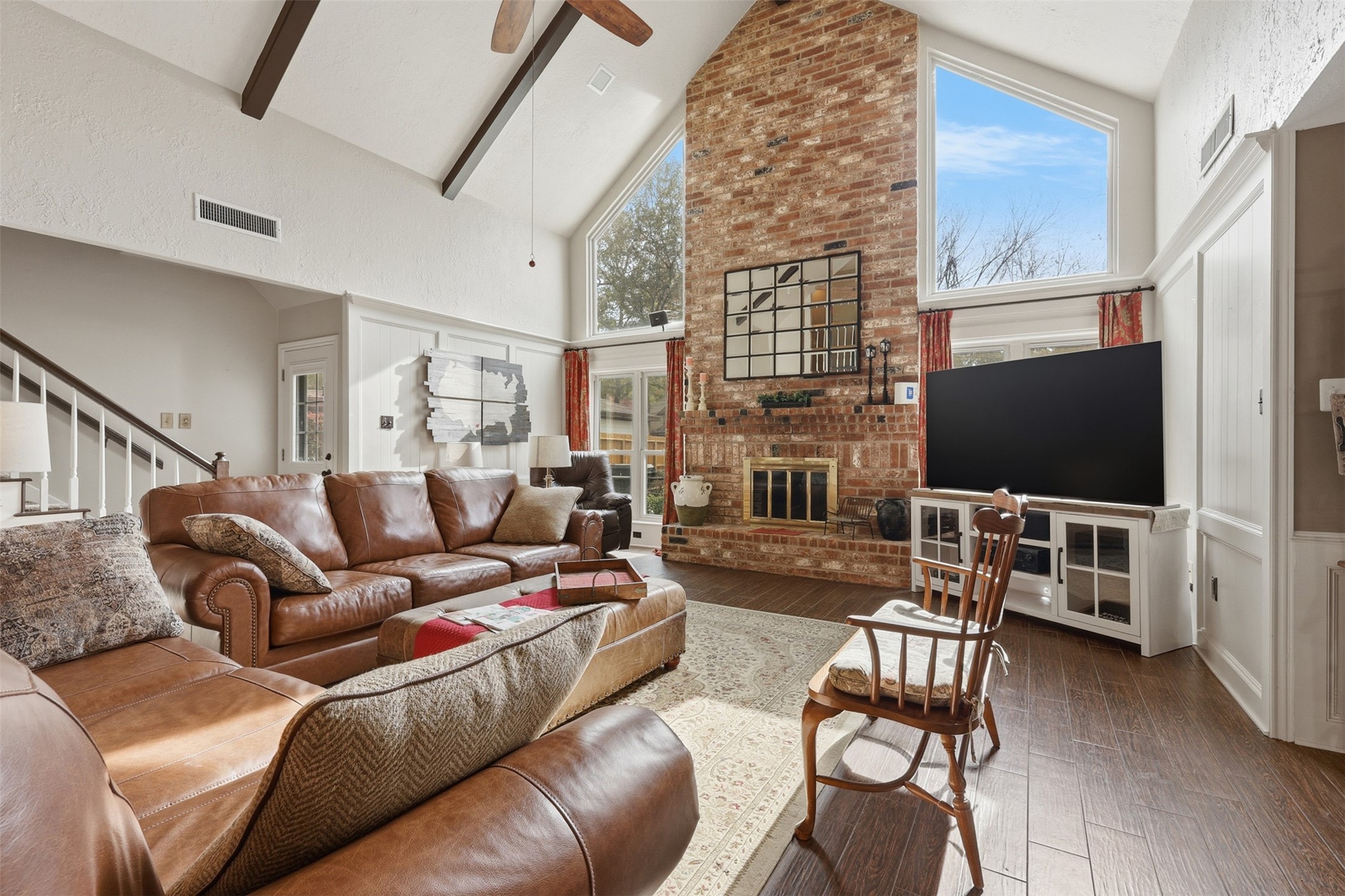 3415 Flickering Candle Drive Spring, TX 77388 - Photo 22 of 36 a living room with furniture and a flat screen tv