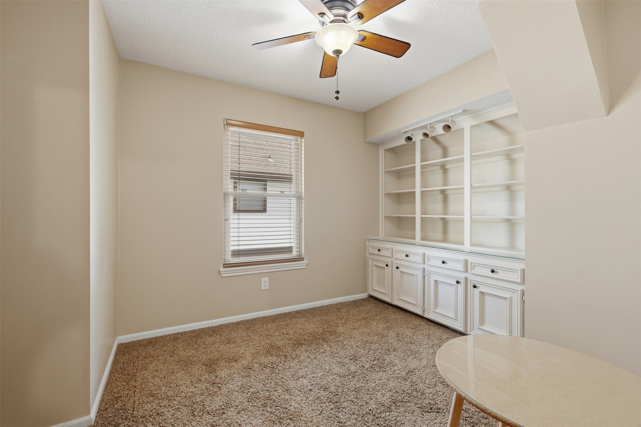 3415 Flickering Candle Drive Spring, TX 77388 - Photo 25 of 36 an empty room with windows and cabinet
