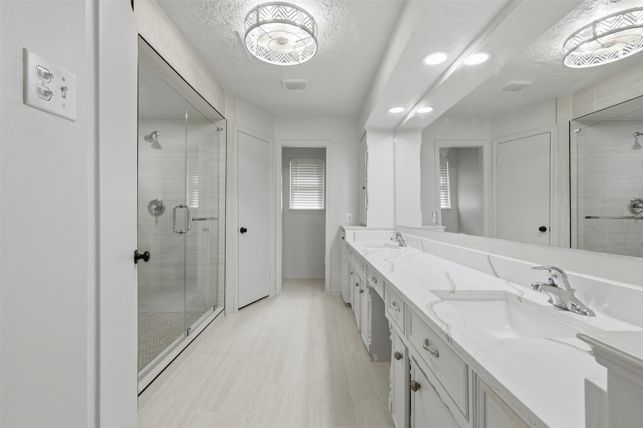 3415 Flickering Candle Drive Spring, TX 77388 - Photo 7 of 36 a spacious bathroom with a double vanity sink mirror and double