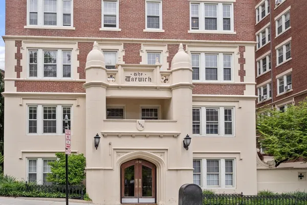 a view of building with a window and brick walls