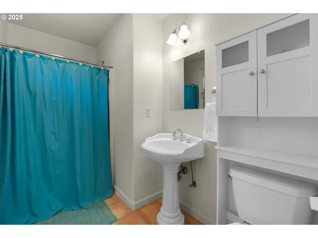a bathroom with a sink and mirror