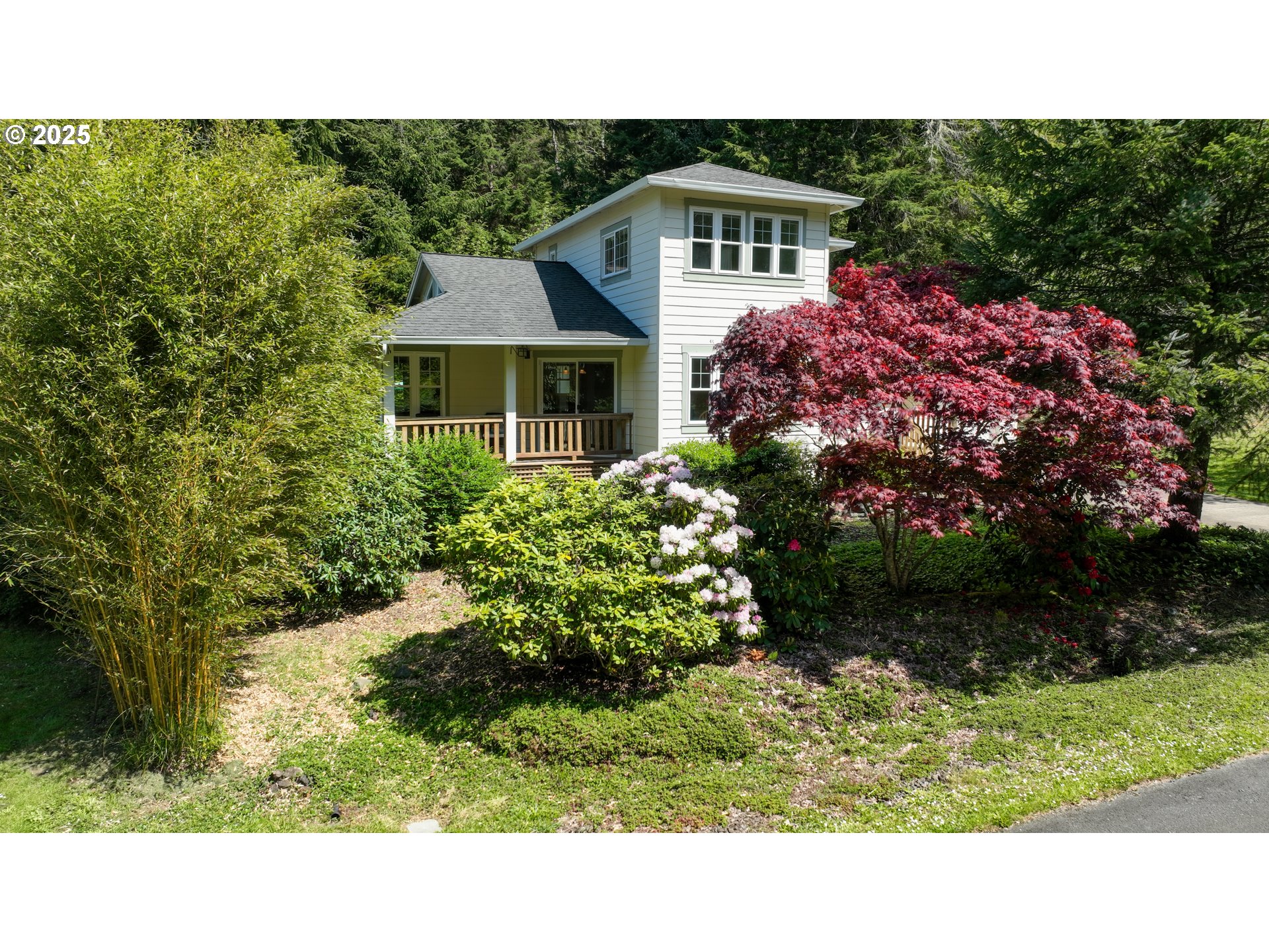 9330 Dewolf Road Nehalem, OR 97131 - Photo 2 of 24 a black and white photo of a house