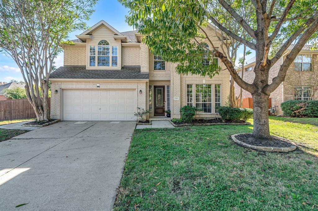 1701 Tree Line Road Flower Mound, TX 75028 - Photo 1 of 1 View of front of home featuring a front yard and a garage