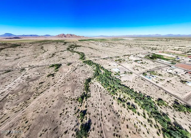 an aerial view of beach and space