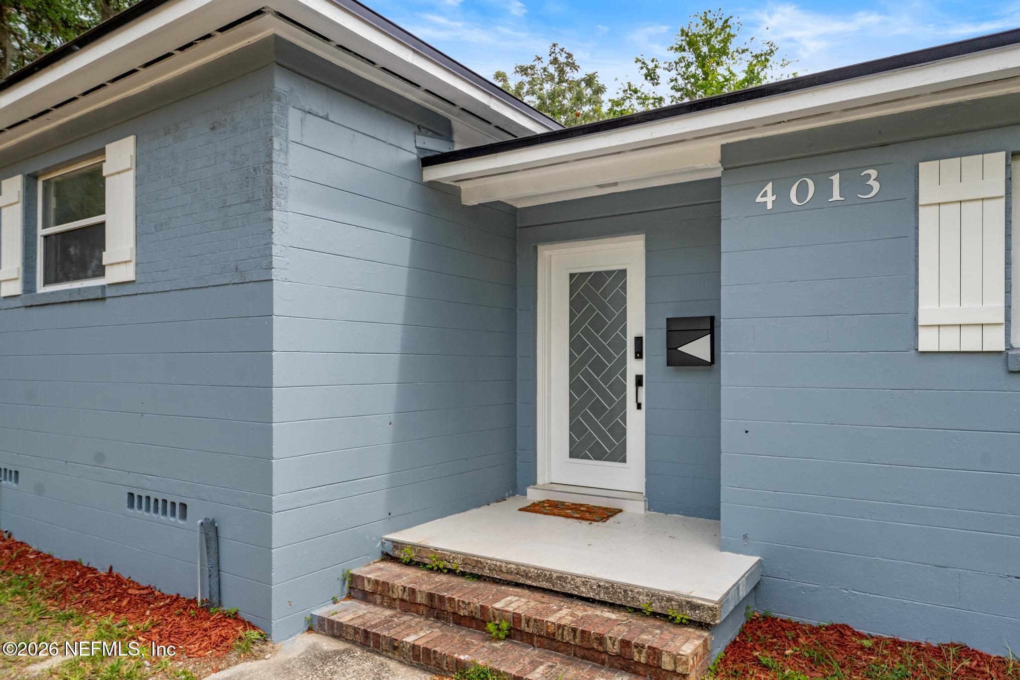 4013 Rogero Road Jacksonville, FL 32277 - Photo 5 of 32 FRONT OF THE HOUSE