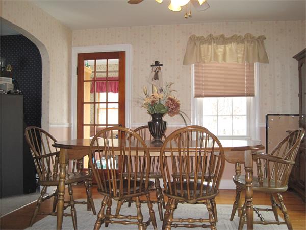 33 Smith Road Sutton, MA 01590 - Photo 2 of 16 a view of a dining room with furniture and windows