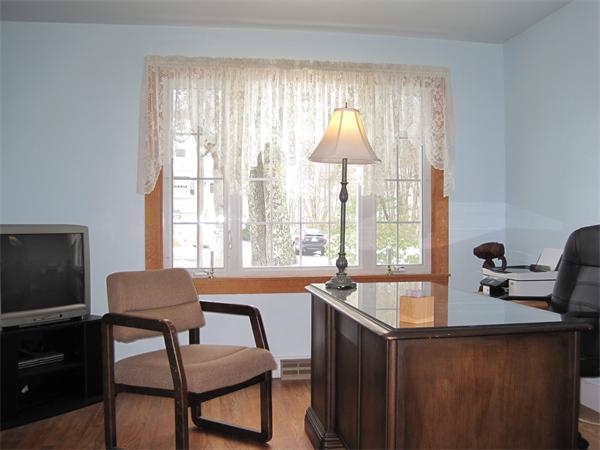 33 Smith Road Sutton, MA 01590 - Photo 4 of 16 a dining room with a table and chairs