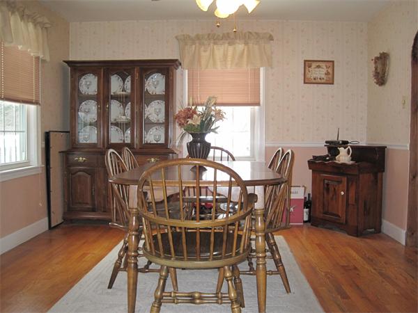 33 Smith Road Sutton, MA 01590 - Photo 7 of 16 a view of a dining room with furniture and window