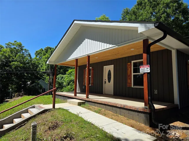 a house with trees in the background