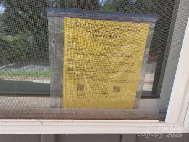 a view of a house with garden and porch