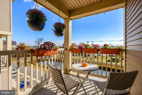 a view of a lake with sitting area