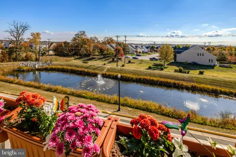a bathroom with a sink toilet and mirror
