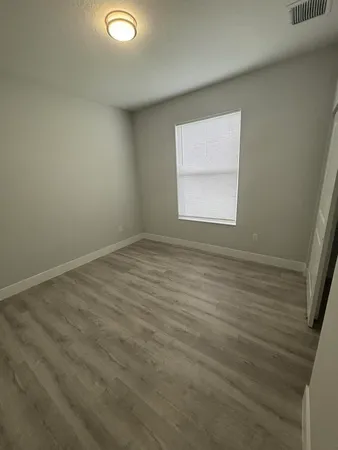an empty room with a window