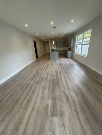 a view of livingroom with furniture wooden floor and window