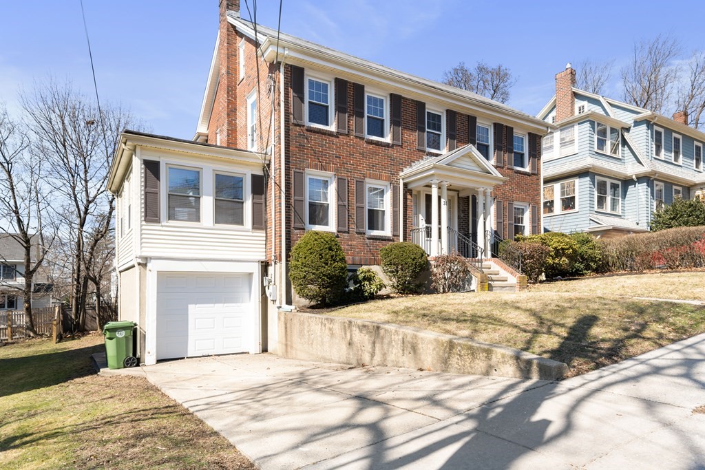 35 Lovell Road Watertown, MA 02472 - Photo 2 of 42 a front view of a house with a yard