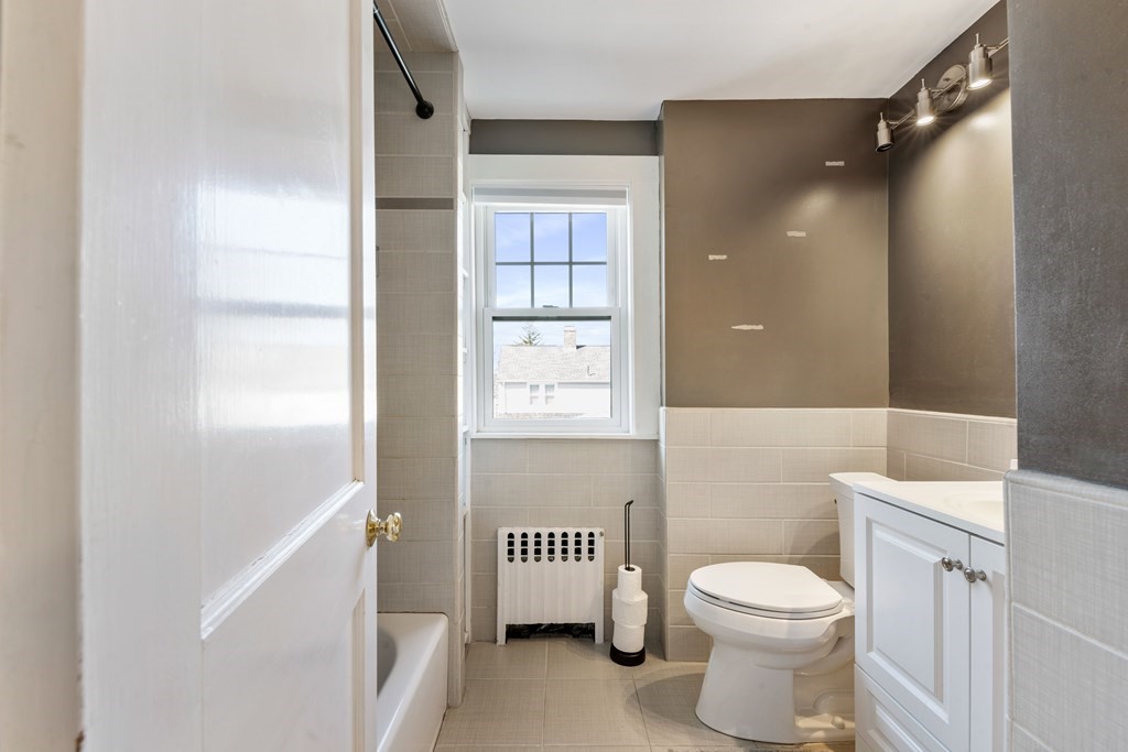 35 Lovell Road Watertown, MA 02472 - Photo 28 of 42 a bathroom with a toilet and a shower
