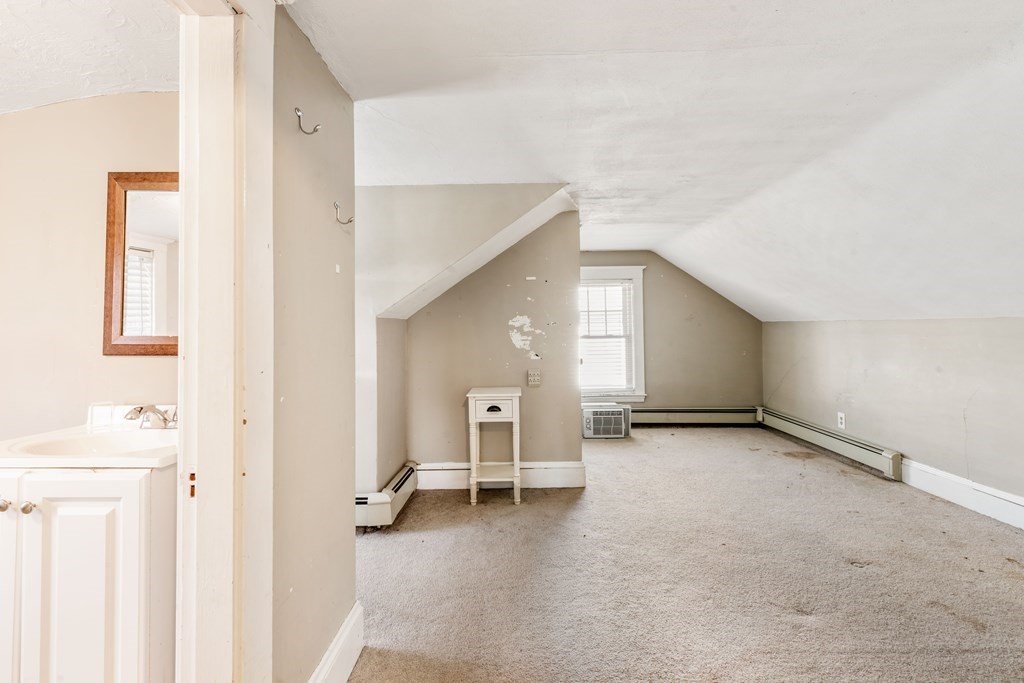 35 Lovell Road Watertown, MA 02472 - Photo 33 of 42 a view of a livingroom with a staircase