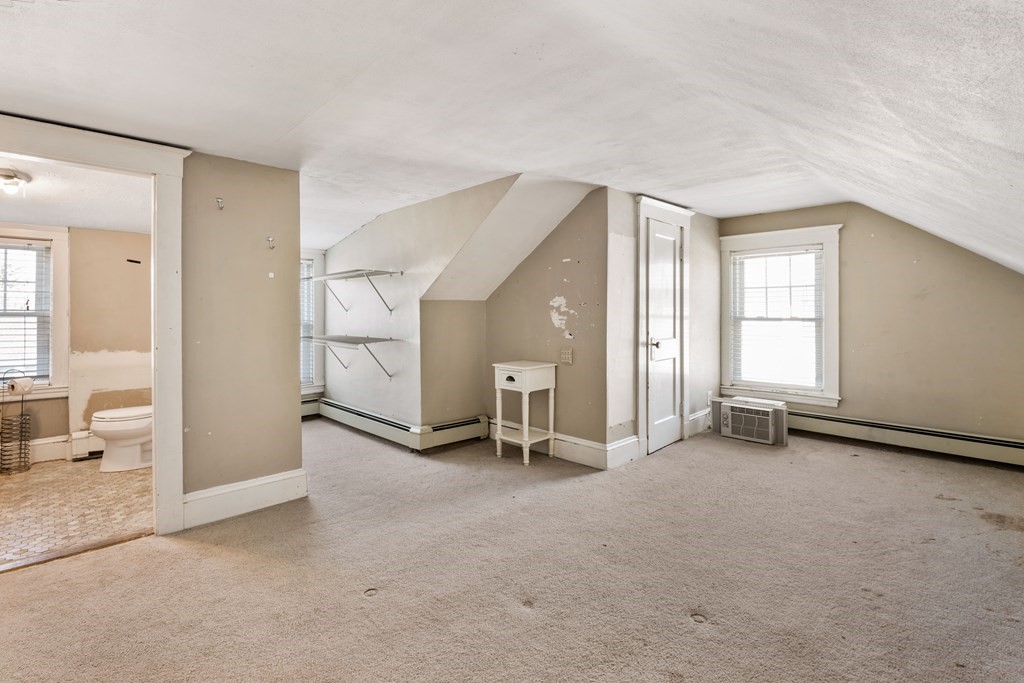 35 Lovell Road Watertown, MA 02472 - Photo 35 of 42 a view of a livingroom with furniture and a window