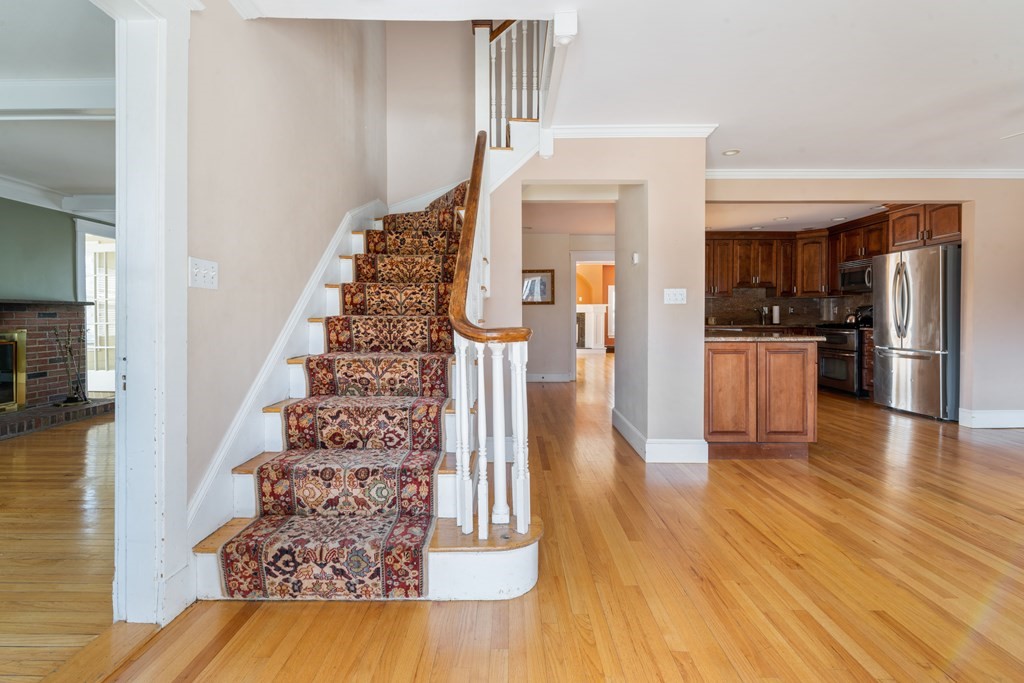 35 Lovell Road Watertown, MA 02472 - Photo 4 of 42 a view of a kitchen from the hallway