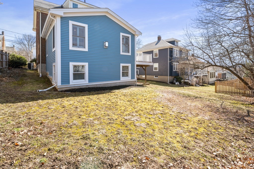 35 Lovell Road Watertown, MA 02472 - Photo 41 of 42 a view of a yard with a house