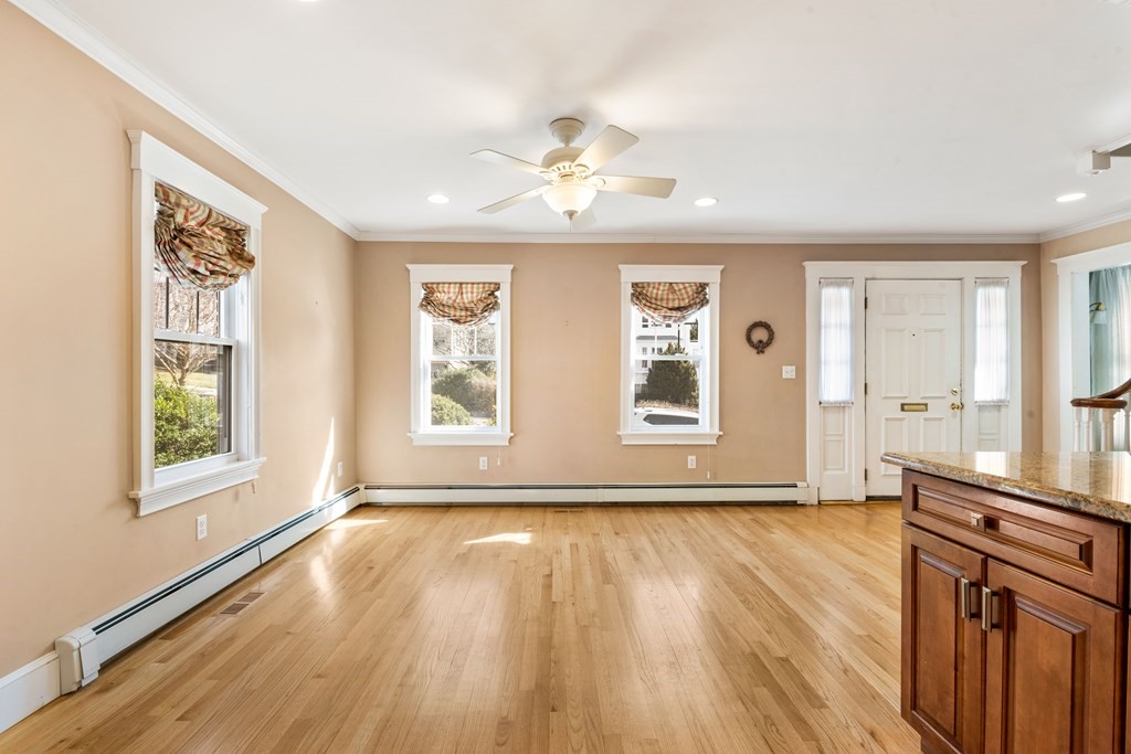 35 Lovell Road Watertown, MA 02472 - Photo 9 of 42 a view of an empty room with a window and wooden floor