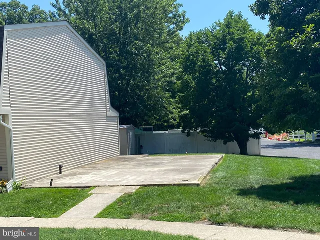 a view of a backyard with a garden