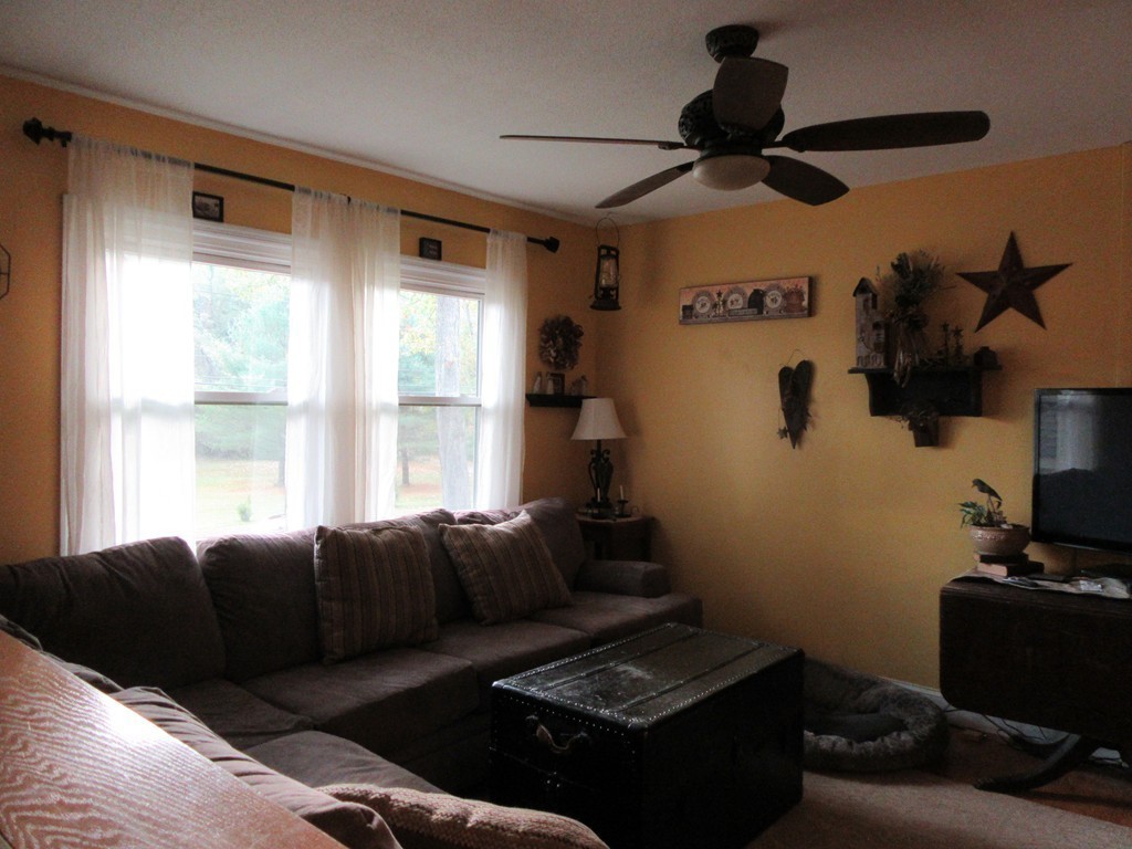 731 Florence Road Northampton, MA 01062 - Photo 12 of 29 a living room with furniture and a window