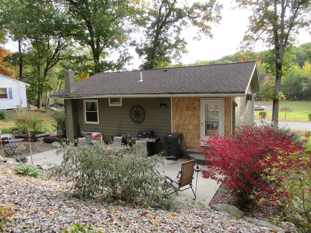 731 Florence Road Northampton, MA 01062 - Photo 28 of 29 a front view of house with yard and trees around