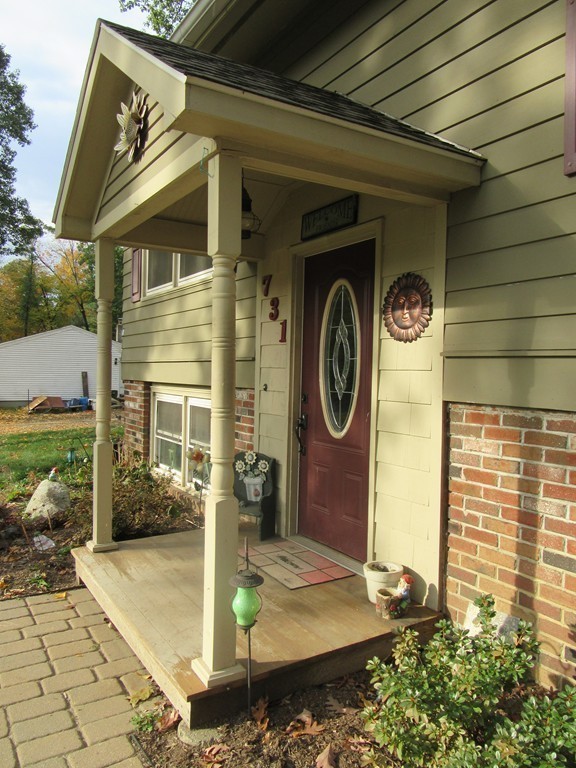 731 Florence Road Northampton, MA 01062 - Photo 29 of 29 a front view of a house with garden