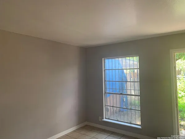 an empty room with windows