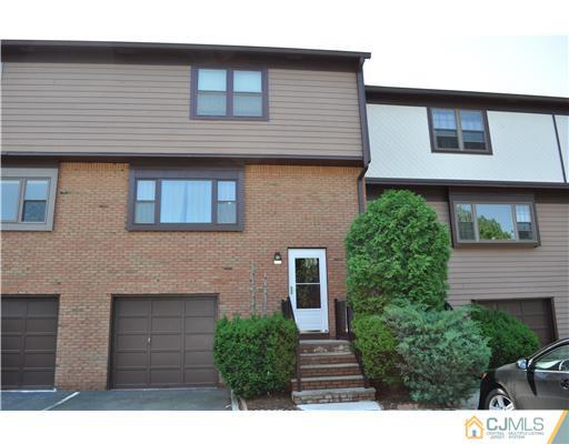 7104 Hana Road Edison, NJ 08817 - Photo 1 of 10 a view of a house with a yard