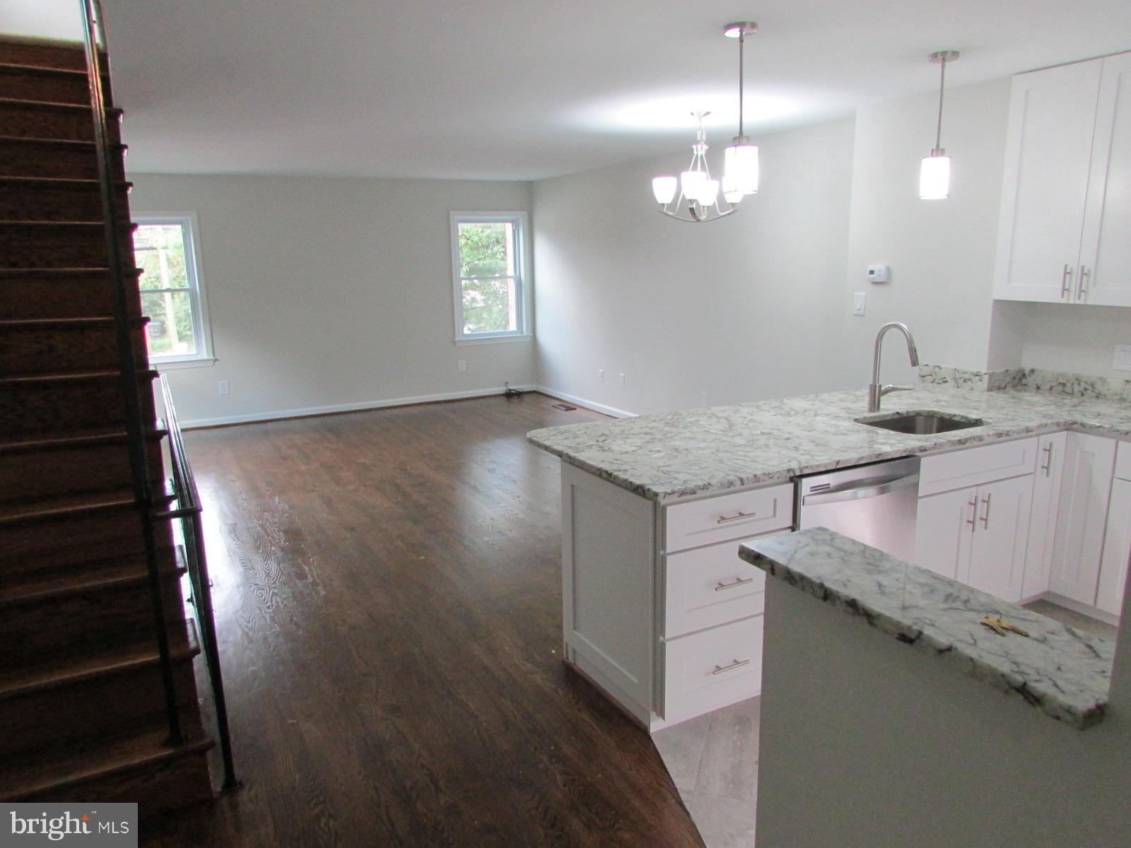 2029 South Glebe Road Arlington, VA 22206 - Photo 2 of 14 a view of a kitchen sink cabinets and wooden floor