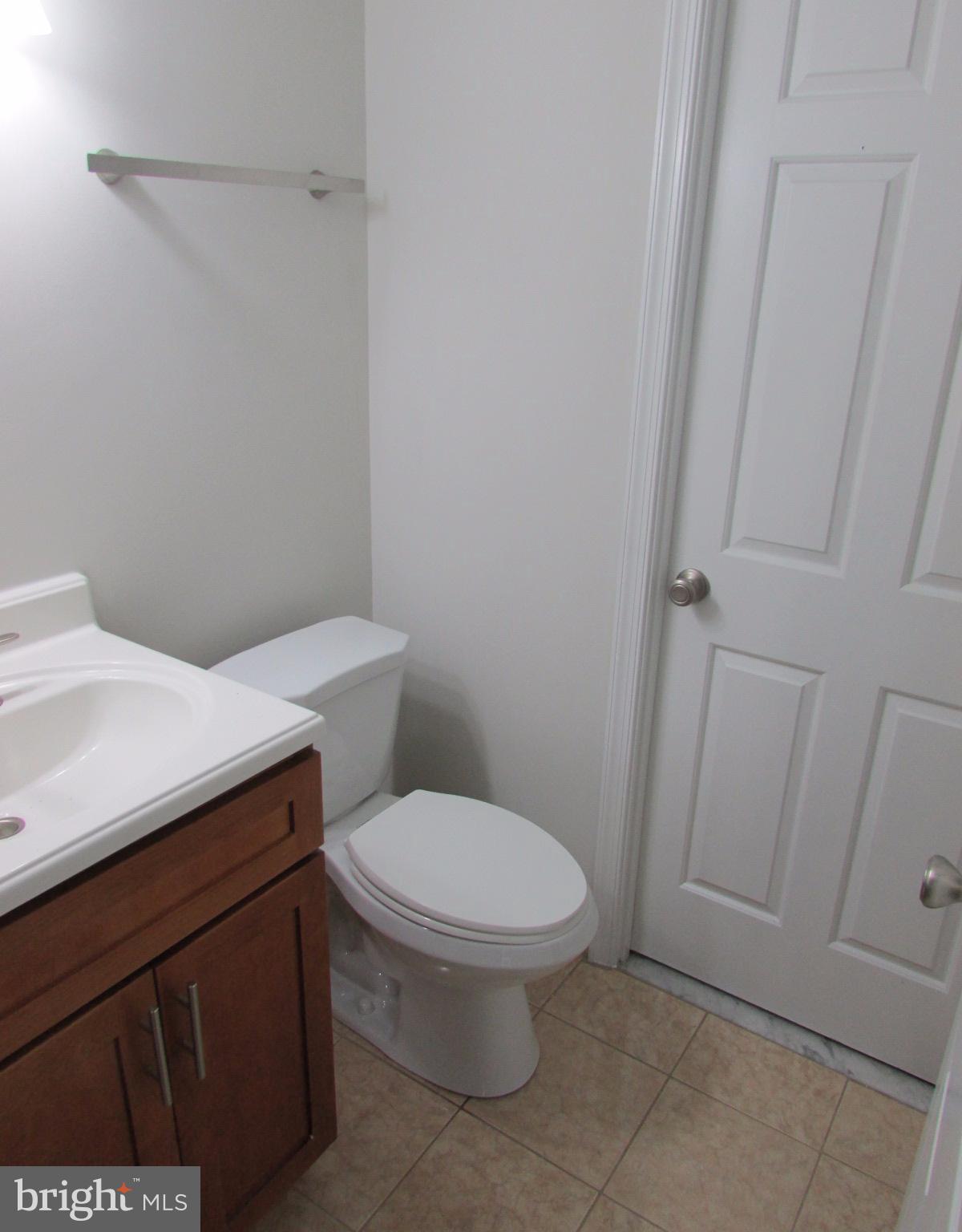 2029 South Glebe Road Arlington, VA 22206 - Photo 13 of 14 a white toilet sitting next to a sink