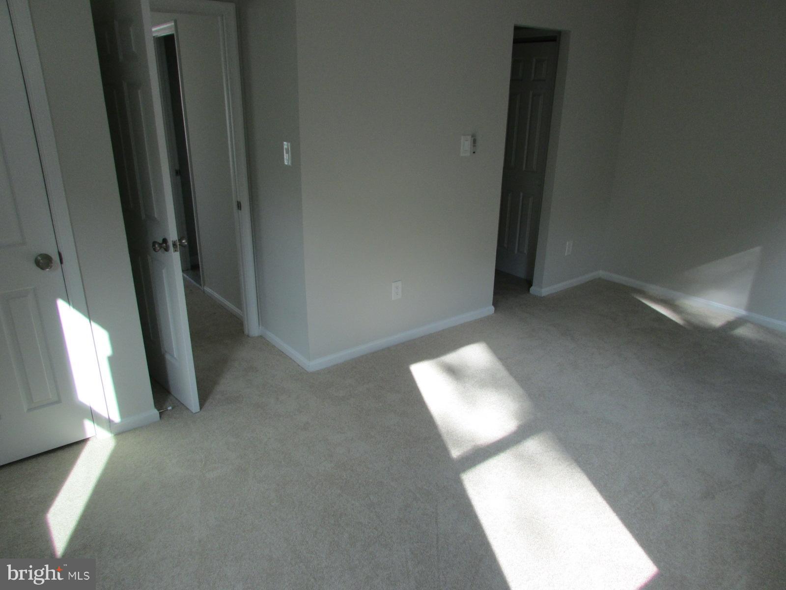 2029 South Glebe Road Arlington, VA 22206 - Photo 8 of 14 wooden floor in an empty room with a window