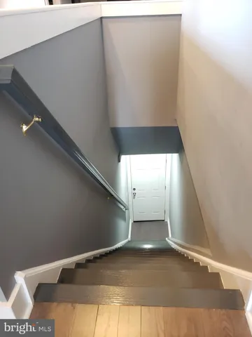 a bathroom with a bathtub and a toilet