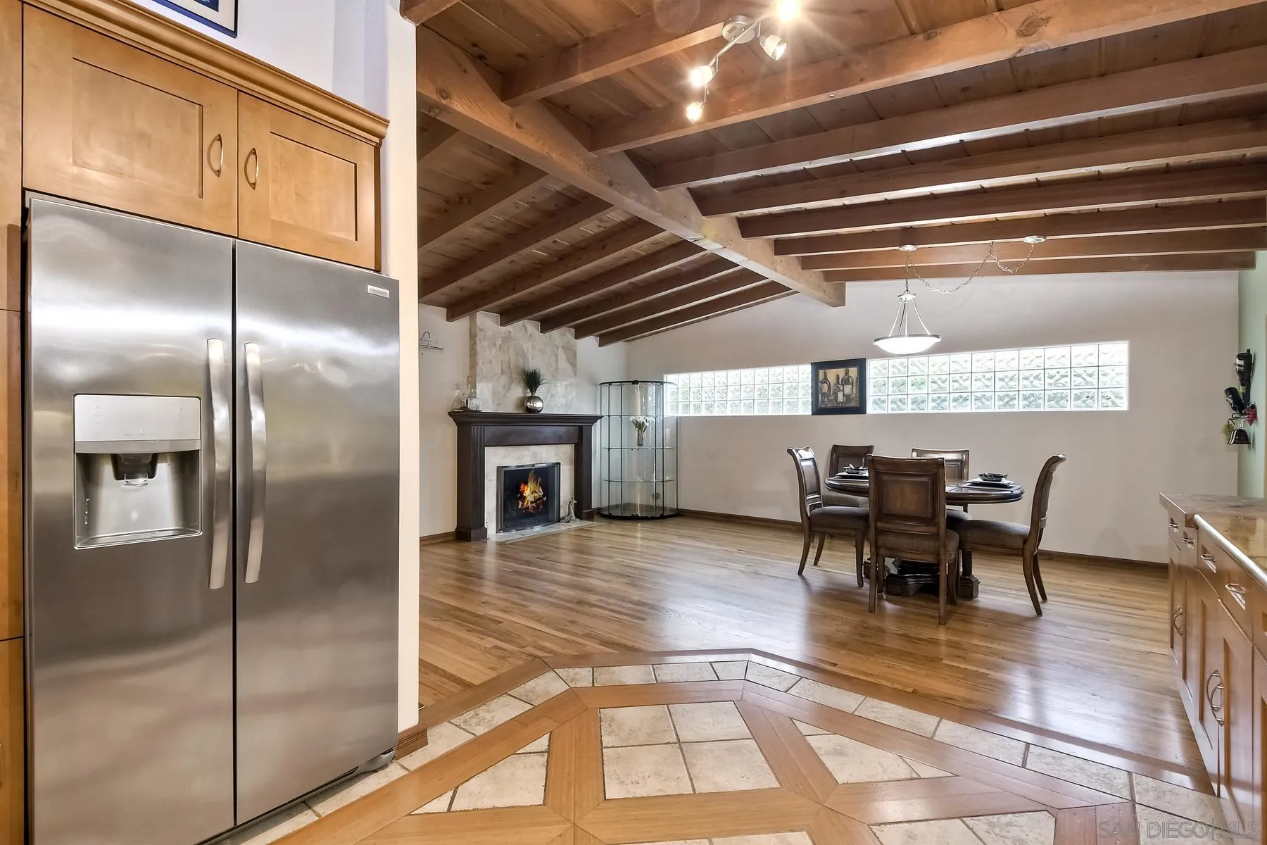 536 Saxony Road Encinitas, CA 92024 - Photo 12 of 57 a view of a livingroom with furniture and a kitchen