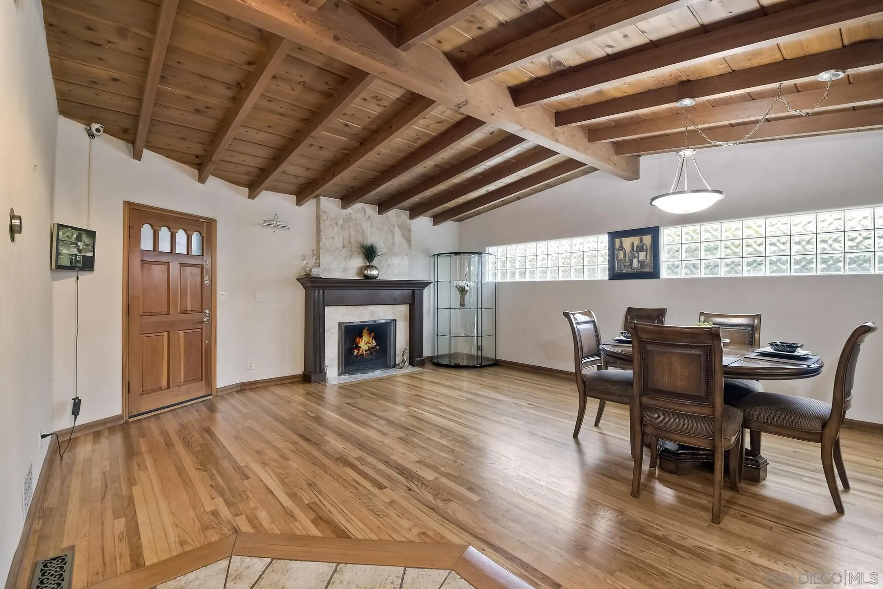536 Saxony Road Encinitas, CA 92024 - Photo 15 of 57 a view of a livingroom with furniture and a fireplace