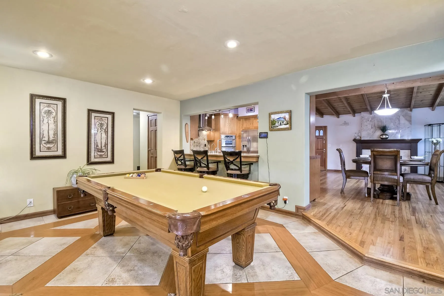 536 Saxony Road Encinitas, CA 92024 - Photo 21 of 57 a room with table tennis and dining table