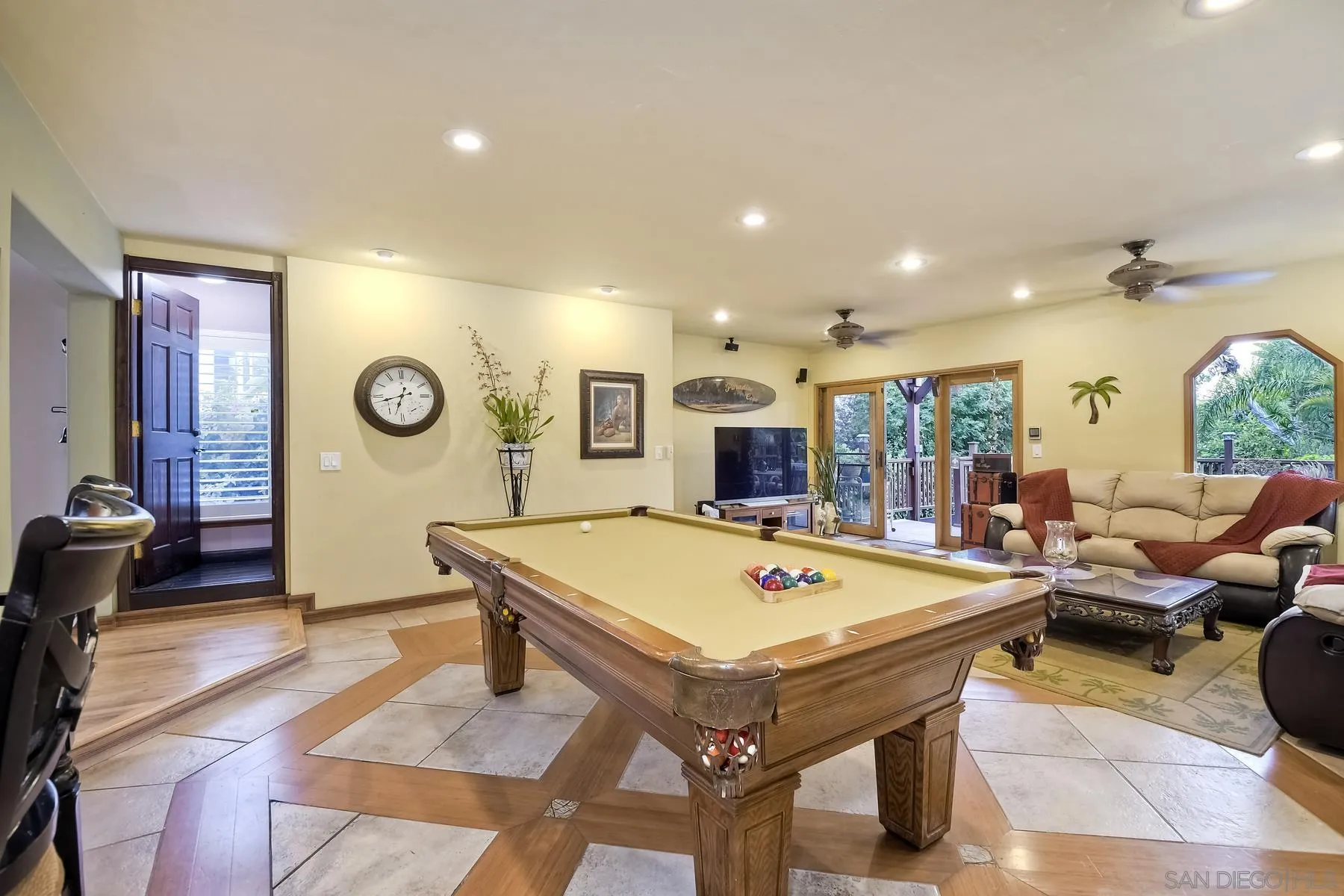 536 Saxony Road Encinitas, CA 92024 - Photo 22 of 57 a view of a dining room with furniture and a large window